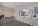 An open layout connects the modern kitchen to the living room, great for entertaining at 6250 W Flamingo Rd # 51, Las Vegas, NV 89103