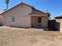 A blank canvas awaits you in this backyard, ready for your dream oasis! at 6340 Cranberry Ln, Las Vegas, NV 89156