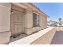 Welcoming entryway with a security door and a 'Welcome Friends' doormat at 1011 Dancing Vines Ave, Las Vegas, NV 89183