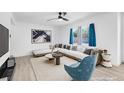 Bright living room with white walls, modern furniture, and natural light at 1411 Norman Ave, Las Vegas, NV 89104