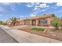 Nice single story home featuring low maintenance desert landscaping at 1468 Harmony Hill Dr, Henderson, NV 89014