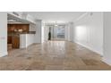 Spacious living room with neutral walls, recessed lights, and a walk-out patio with city views at 2777 Paradise Rd # 1002, Las Vegas, NV 89109