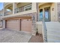 Charming home with brick accents, a balcony, and a three-car garage at 8565 Silver Coast St, Las Vegas, NV 89139