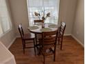 Cozy dining room featuring a round table, four chairs, and a bright window at 9000 Las Vegas Blvd # 1142, Las Vegas, NV 89123