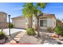 Inviting single story home with a well-maintained yard and desert landscaping at 10613 Tiffanieville Ct, Las Vegas, NV 89129