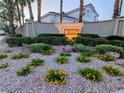 The La Paz community sign is surrounded by mature landscaping with decorative rocks at 9728 Echo Hills Dr, Las Vegas, NV 89134