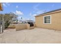 Backyard with a built-in BBQ grill and concrete patio perfect for entertaining at 120 Dogwood St, Henderson, NV 89015