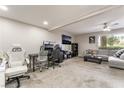 Spacious living room with a ceiling fan and a comfortable, inviting atmosphere at 3221 Yolanda Ln, Las Vegas, NV 89121