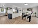 Open concept dining area next to kitchen boasts contemporary decor and ample natural light at 3509 Navajo Way, Las Vegas, NV 89108