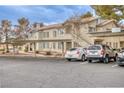 Multi-Gathering building with covered parking and well-maintained landscaping under a cloudy sky at 5265 Caspian Springs Dr # 201, Las Vegas, NV 89120