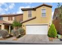 Charming two-story home with a two-car garage and well-maintained landscaping at 5641 Vassar Meadow St, Las Vegas, NV 89148