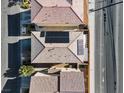 Aerial view showing the roof of the home with solar panels, and a white covered patio at 5667 Foxglove Field St, Las Vegas, NV 89130