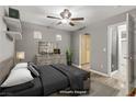 Bright main bedroom featuring a ceiling fan, closet, ensuite bathroom and modern decor at 6953 Graceful Cloud, Henderson, NV 89011