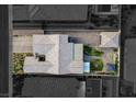 Expansive aerial view of a single-Gathering home featuring a private yard with lush landscaping, a gazebo, and a large patio at 7036 Winstar St, Las Vegas, NV 89131