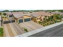 Beautiful home with a brick driveway and front yard landscaping at 7036 Winstar St, Las Vegas, NV 89131