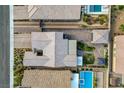 Bird's eye view of a home with backyard pool and landscaping at 7036 Winstar St, Las Vegas, NV 89131