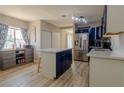 Spacious kitchen with a large island, stainless steel appliances, and a window at 920 Biltmore Dr, Las Vegas, NV 89101