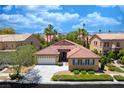Lovely single-story home boasting desert landscaping, a two-car garage, and a beautiful tile roof at , Las Vegas, NV 89113