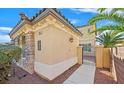 Close-up view of the home's side entrance and gate to the backyard at 10001 Blairwood Ct, Las Vegas, NV 89178