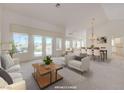 Spacious living room boasts bright light with views to backyard, and opens to the dining area at 2808 Crown Ridge Dr, Las Vegas, NV 89134