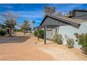 Quaint single-story home showcasing drought-tolerant landscaping and a modern pergola at the entryway at 3924 Blackford Pl, Las Vegas, NV 89102