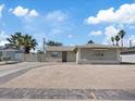 Charming single story home featuring desert landscaping, a driveway, and mature landscaping at 4204 El Jardin Ave, Las Vegas, NV 89102