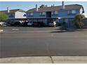 Multi-Gathering home exterior with covered parking and well-maintained landscaping at 5841 Medallion Dr # 102, Las Vegas, NV 89122