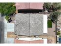 Bird's eye view of home featuring dark roof and white patio cover, showing layout and surrounding landscaping at 6133 Roseboro Ct, North Las Vegas, NV 89081