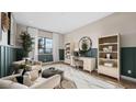 Well-lit bedroom designed as an office with furniture, a window, and neutral tones at 12212 Elderwood St, Las Vegas, NV 89138