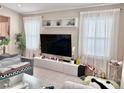 Cozy living room with large windows and tile floors at 3114 Molinos Dr, Las Vegas, NV 89141