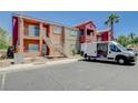 Multi-level apartment building featuring private balconies with outdoor staircases at 4730 E Craig Rd # 1005, Las Vegas, NV 89115