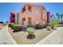Well-maintained apartment complex with neatly trimmed bushes and desert landscaping at 4730 E Craig Rd # 1005, Las Vegas, NV 89115