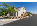 Charming two-story home with a well-manicured front yard and an ample driveway at 6442 Kobe Knoll Ct, Las Vegas, NV 89141
