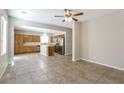 Open floor plan shows kitchen with stainless appliances from the living area at 6591 Gertrude Ct, Las Vegas, NV 89141
