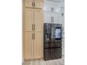 Modern kitchen with stainless steel appliances and custom cabinets at 10709 Hunters Woods Pl, Las Vegas, NV 89134