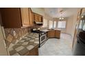 Bright kitchen featuring modern stainless steel appliances and ample counter space at 1081 Overture Dr, Las Vegas, NV 89123