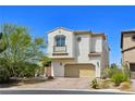 A charming two-story home with a terracotta tile roof, a two-car garage, and neat landscaping at 396 Blackstone River Ave, Las Vegas, NV 89148
