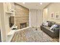 Charming living room featuring a modern fireplace, comfortable seating, and stylish decor at 4200 S Valley View Blvd # 3074, Las Vegas, NV 89103