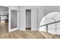 Bedroom featuring sleek floors, closet, and modern design at 10200 Wood Work Ln, Las Vegas, NV 89135