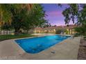 Inviting backyard pool with ample patio space, perfect for relaxation and entertaining guests at 3108 Sonia Dr, Las Vegas, NV 89107