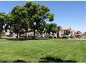 Well-manicured grounds with large shade trees enhance the outdoor space at 3318 N Decatur Blvd # 2077, Las Vegas, NV 89130