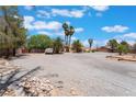 Expansive lot with desert landscaping and plenty of space for parking and storing vehicles at 4530 W Shelbourne Ave, Las Vegas, NV 89139