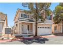 Inviting two-story home with a two-car garage and walkway to front door at 5228 Shasta Lake Way, Las Vegas, NV 89118