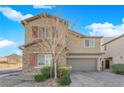 This home has stone facade, neutral stucco siding, well-kept landscaping and a gray two car garage at 7707 W Diablo Dr, Las Vegas, NV 89113
