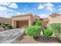 Charming one-story home features an attached garage, desert landscaping, and a well-maintained exterior at 9424 Gold Mountain Dr, Las Vegas, NV 89134