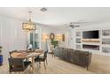 Open-concept living and dining area with modern finishes and ample natural light at 10463 Pioneer Park Ave, Las Vegas, NV 89135