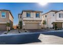 Well-appointed two-story home with a two-car garage, complemented by a tidy front yard at 3921 Painted Lady Ave, Las Vegas, NV 89141