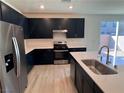 Beautiful kitchen showcasing stainless steel appliances and expansive countertops at 4266 Yucca Brevi Ave, Las Vegas, NV 89139