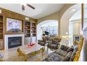 Luxurious living room with fireplace and open layout with marble floors at 9101 Alta Dr # 301, Las Vegas, NV 89145