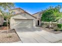 Charming two-story home featuring a spacious two car garage and a well maintained front yard at 9507 Brewing Cloud Ave, Las Vegas, NV 89148